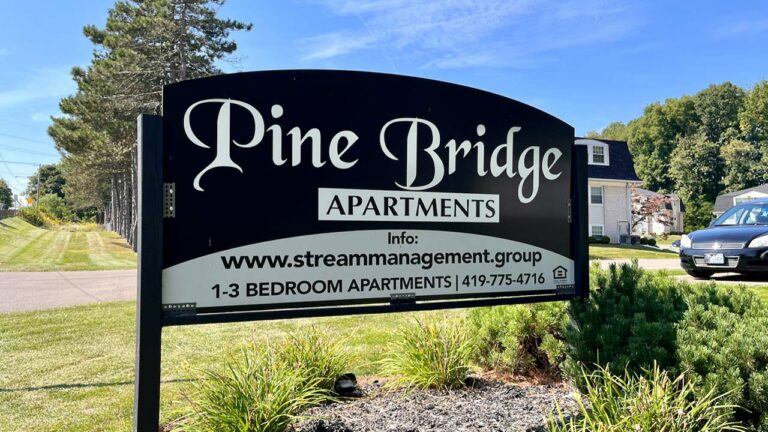 Pine Bridge Apartments - property sign