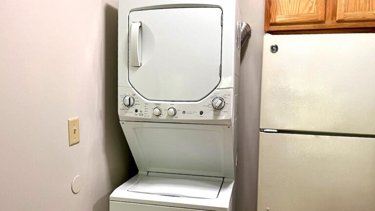 Pine Bridge Apartments stacked washer and dryer in kitchen